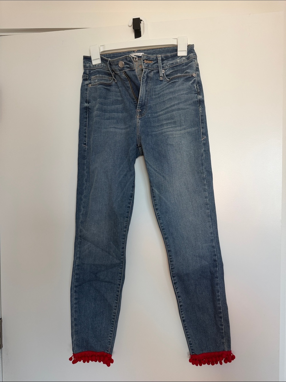 Good American Blue Denim Ankle Jeans with Red Pom-Pom Trim